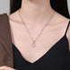 Geometric Sphere Cross Chain Necklace